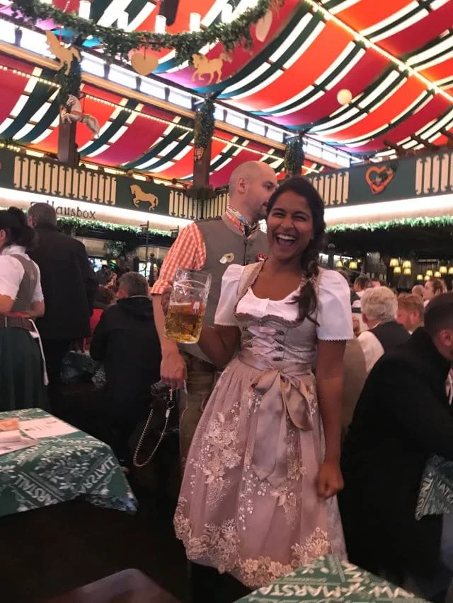 Prost and have fun at Oktoberfest, girl in drindl