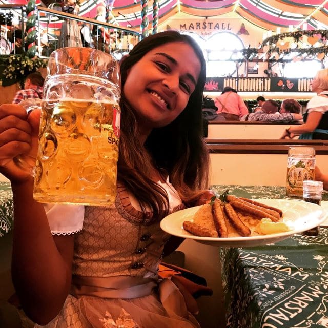 Marstall tent in background with sausage and beer 